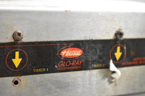 Hatco GRMW-3 stainless steel commercial countertop heated merchandiser, 120 volts, with Glo-Ray label and timer controls.