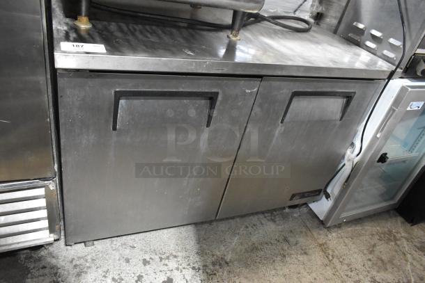 True TUC-48F stainless steel commercial 2-door undercounter freezer with commercial casters, 115V, 1 phase. Some surface wear.