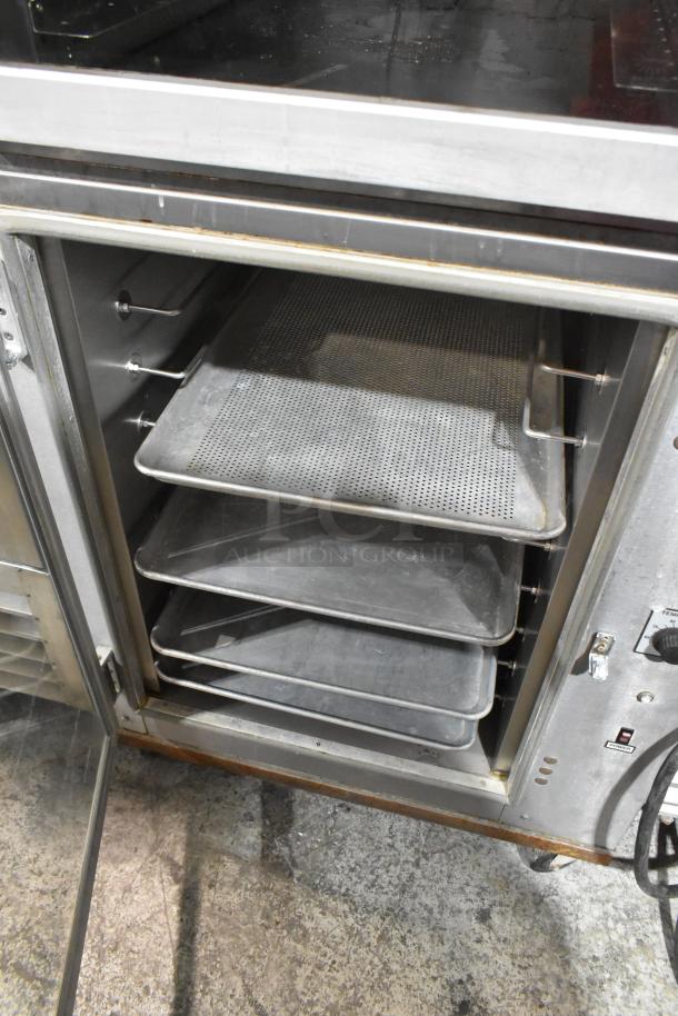 Deluxe HSM-4 stainless steel oven proofer with trays visible, 120/220V, 1 phase, commercial use, good condition.