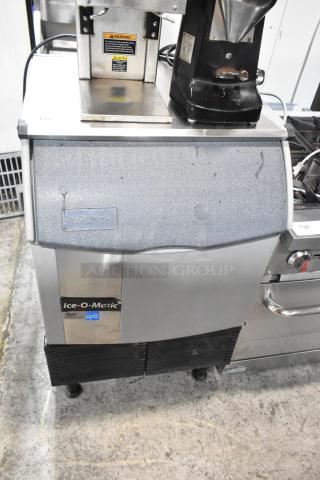 2016 Ice-O-Matic ICEU150GA6 ice machine, metal finish, commercial use, 115 volts, 1 phase, self-contained. Visible brand logo.