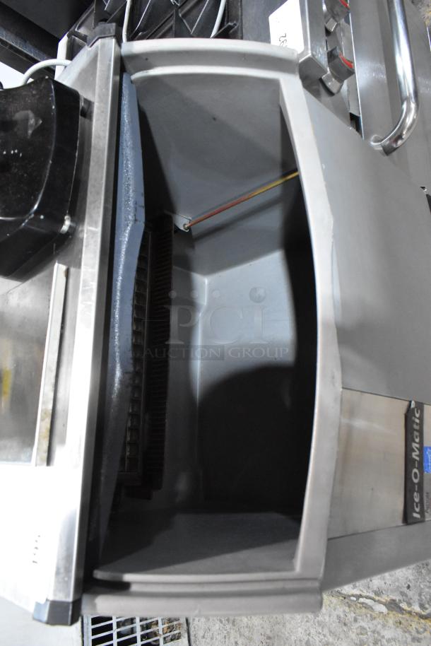 2016 Ice-O-Matic ICEU150GA6 metal commercial ice machine, 115 volts, 1 phase, in good condition, interior view.