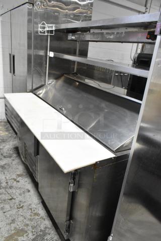 2020 Leader NLM60 stainless steel sandwich prep table, 2-tier overshelf, food warming strip, on commercial casters.