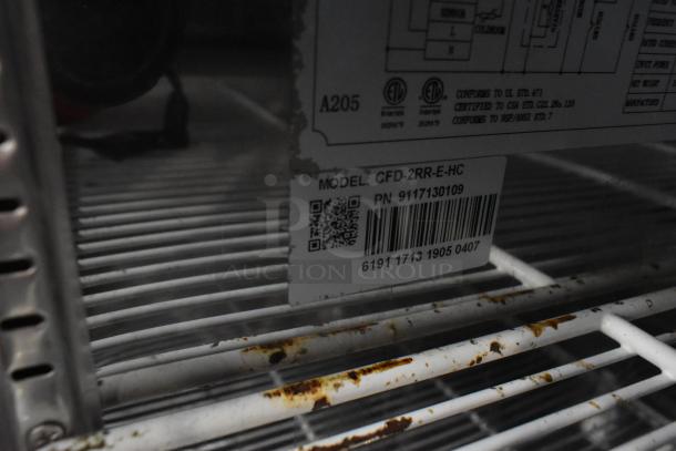 Coldline CFD-2RR-E-HC 2 Door Cooler, stainless steel, poly racks, on casters, model label visible.