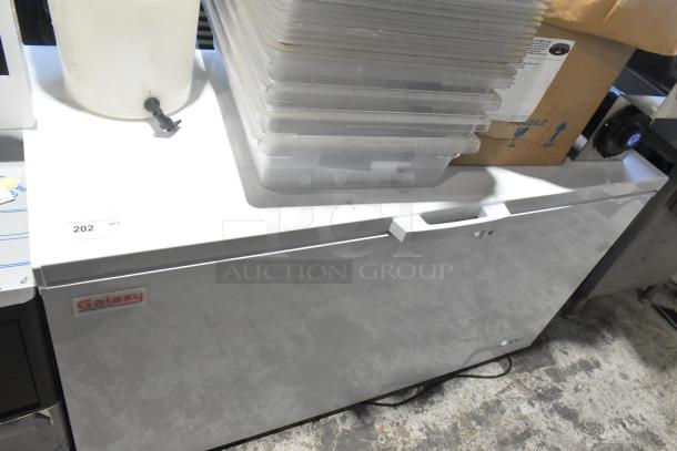 Galaxy 177CF16HC Metal Chest Freezer with hinge lid, 115 volts, model 177CF16HC, good condition, visible logo.