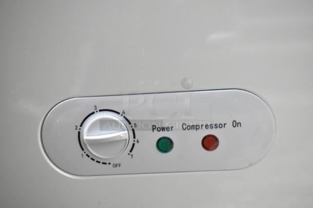 Galaxy 177CF16HC metal chest freezer, hinge lid, visible control panel with temperature dial, power and compressor lights.