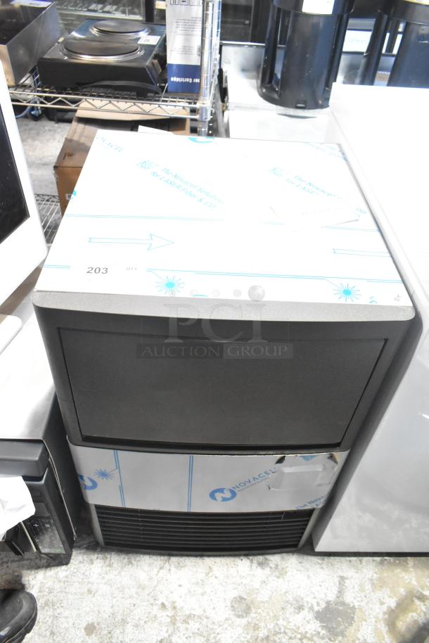 Brand new Manitowoc UDP-0065A stainless steel ice machine, scratch and dent, 31 lb. bin, 62 lb. capacity, 115V.