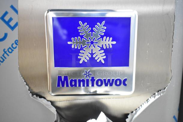 Brand new Manitowoc 499UDP0065AA stainless steel ice machine, scratch and dent condition, with 31 lb. bin.