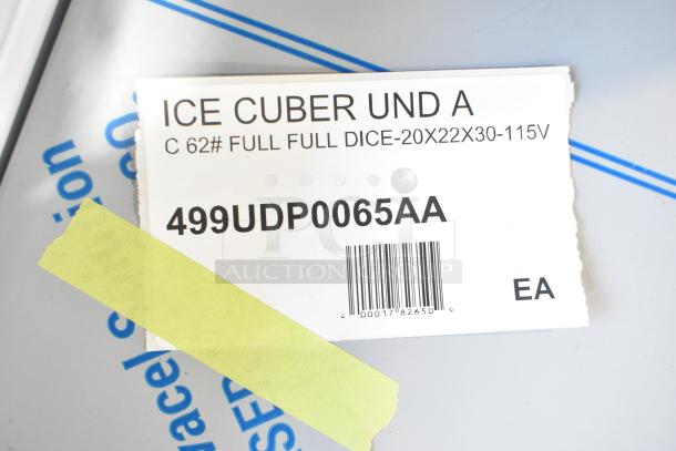 "Manitowoc stainless steel ice machine tag showing model 499UDP0065AA and specs: 62#, full dice, 115V."