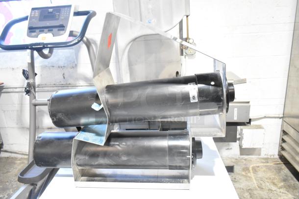 San Jamar Eagle EZ Fit stainless steel cup dispenser, brand new with minor scratches, dual units, NSF certified sticker visible.