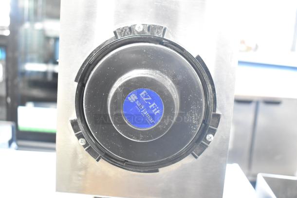 BRAND NEW San Jamar EZ Fit stainless steel cup dispenser, minor scratches, front label reads "EZ Fit San Jamar."