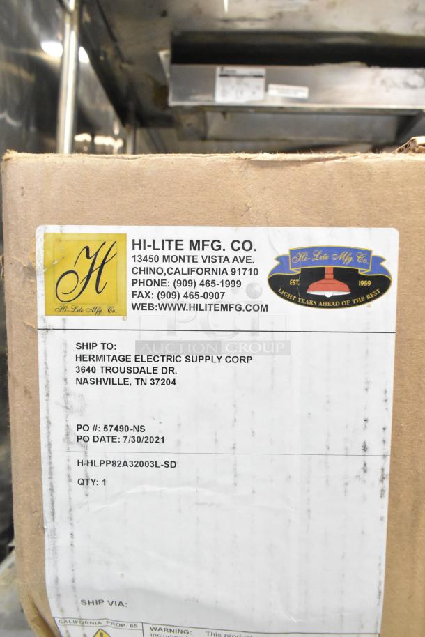Box from Hi-Lite Mfg. Co. with label showing address and contact details. Item includes an orange fixture and hose. Condition: Scratch and Dent.