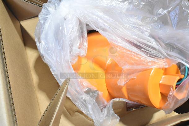 Two brand new orange fixtures with hoses, partially visible in packaging, labeled as scratch and dent items.