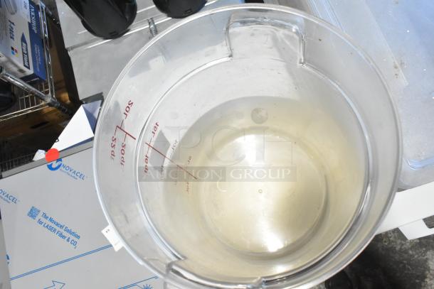 Lot of various items including a clear poly bin with measurement markings, alongside Novacel packaging. Excellent condition.