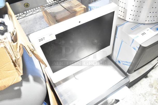 Apple iMac All In One Computer, black screen, white frame, auction tag "207" visible, condition appears good.