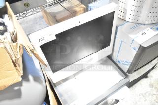 Apple iMac All In One Computer, black screen, white frame, auction tag "207" visible, condition appears good.