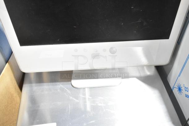 Apple iMac All In One Computer with silver stand, gently used condition, visible Apple logo, power and function status unknown.