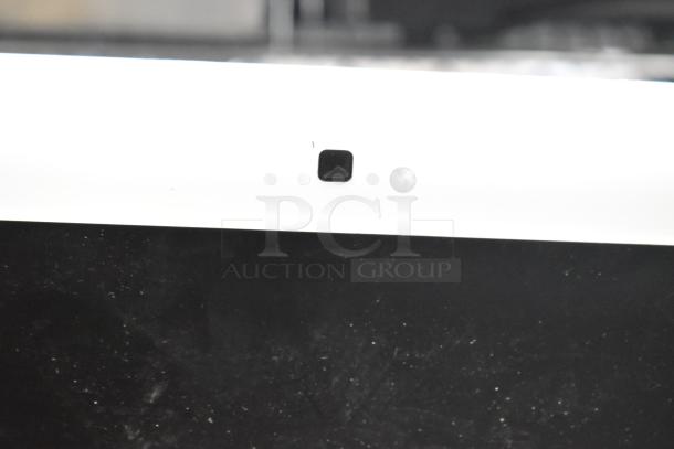 Apple iMac All In One Computer, close-up of webcam area, black bezel, white casing, clean condition.