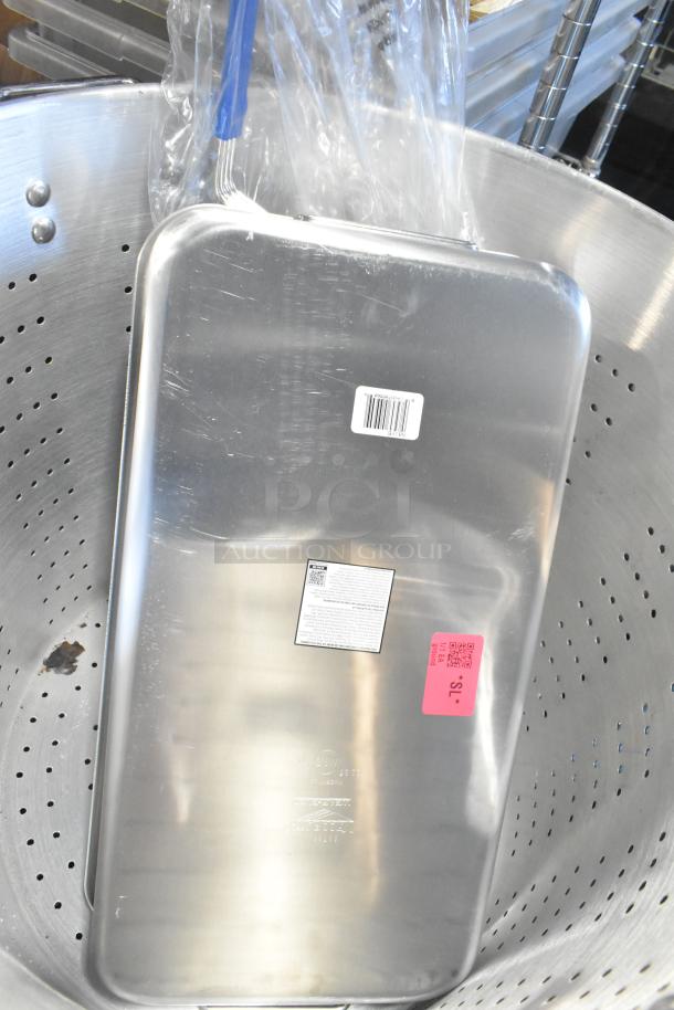 "Brand new Vollrath 68366 Wear-Ever 11.25 Qt. aluminum roasting pan, labeled, handles, 19 3/4" x 10 7/8" x 3 5/8"."