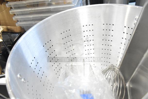 Stainless steel straining pot with fry basket and whisk attachment, part of a 5-piece kitchenware auction set.