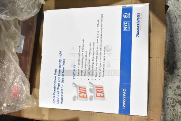 Pallet of various items; includes Thomas & Betts LED Exit Sign in box. Features 20-gauge steel housing, dual voltage.