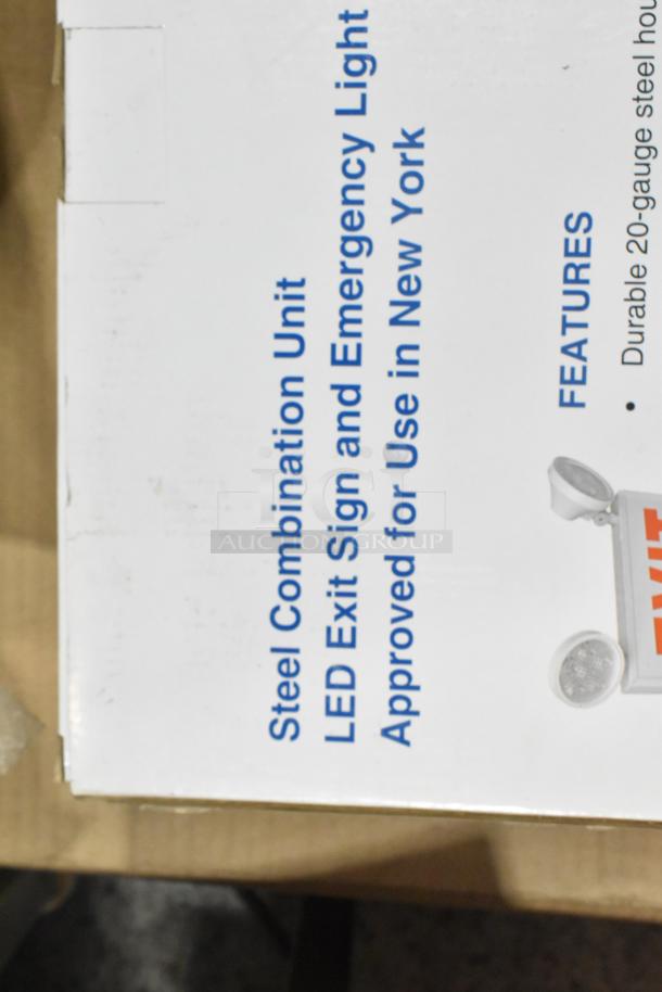 Pallet lot includes LED exit signs labeled "Steel Combination Unit, Approved for Use in New York." Box shown.