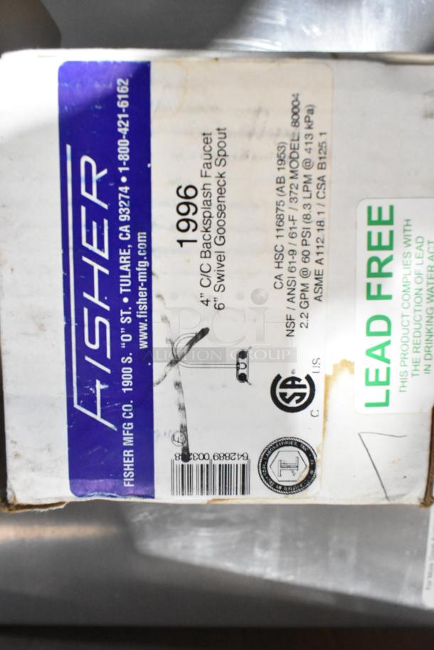 Fisher 1996 kitchen faucet box, specs: 4" backsplash, 6" gooseneck spout, lead-free, NSF certified. Brand info visible.