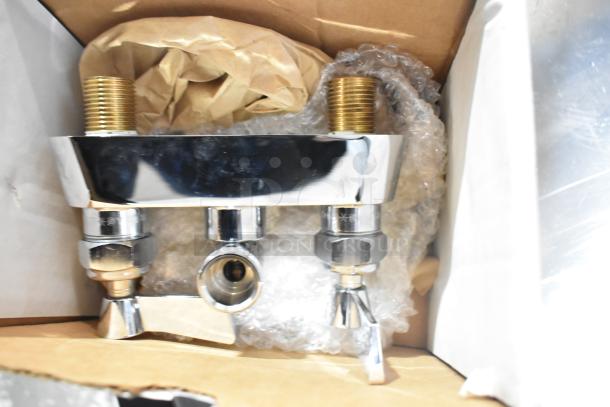 Pallet of items including exit signs, metal baskets, grease filters, 18"x700' butcher paper roll, Fisher faucet handles, coupler, filters, tank.