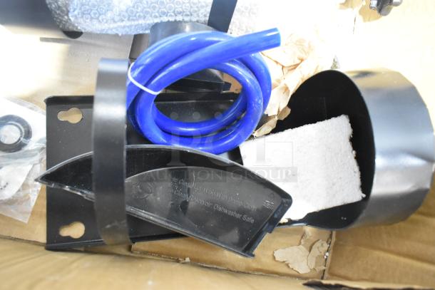 Pallet lot with blue hose, black plastic components, and mounting brackets. Various new and used items.