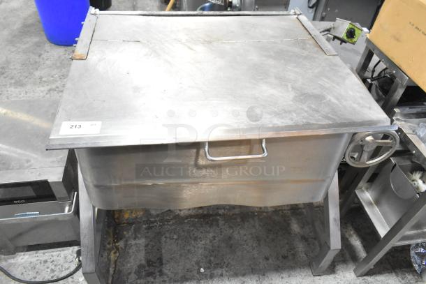 Stainless steel commercial braising pan with handle and lid, showing some rust on corners. Tag indicates item 213.