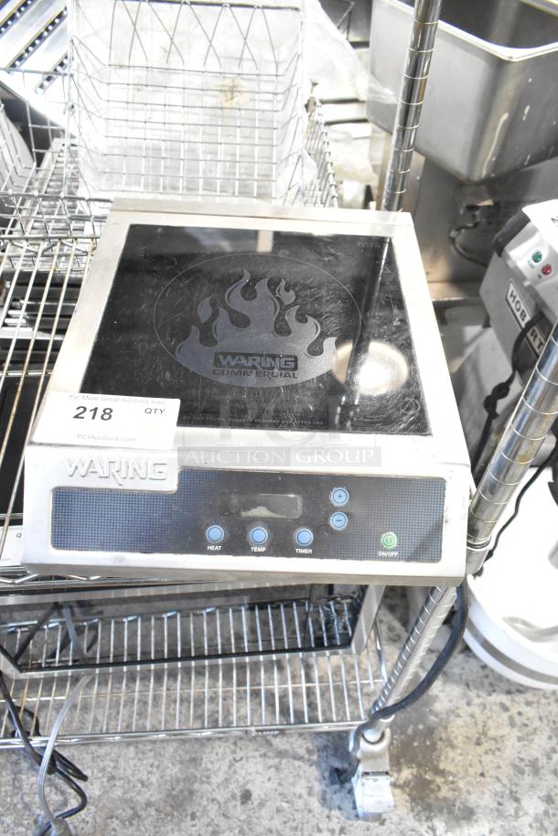Waring WIH400 stainless steel induction range, single burner, countertop model. Features heat, temp, timer controls; 120V, 1 phase.