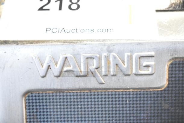 Waring WIH400 Stainless Steel Induction Range; single burner, 120V, 1 phase. Visible logo on textured surface.