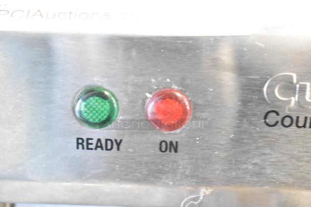 Cuisinart CB-30 countertop single burner with red and green ready/on indicators, stainless steel body.