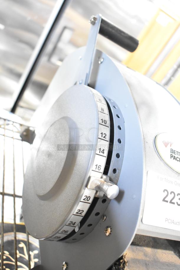 Better Packages 333 Plus manual water-activated tape dispenser, features length setting dial, durable construction, excellent condition.