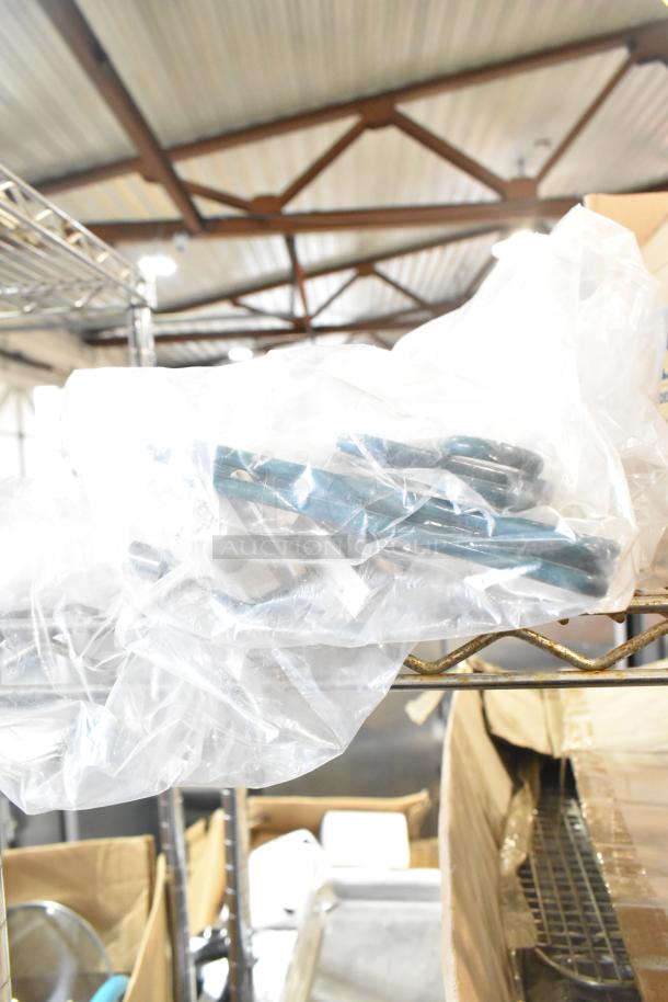 Lot of Rubbermaid amber bins, cables, and brackets in clear bags on shelving. Items appear new, ideal for storage use.