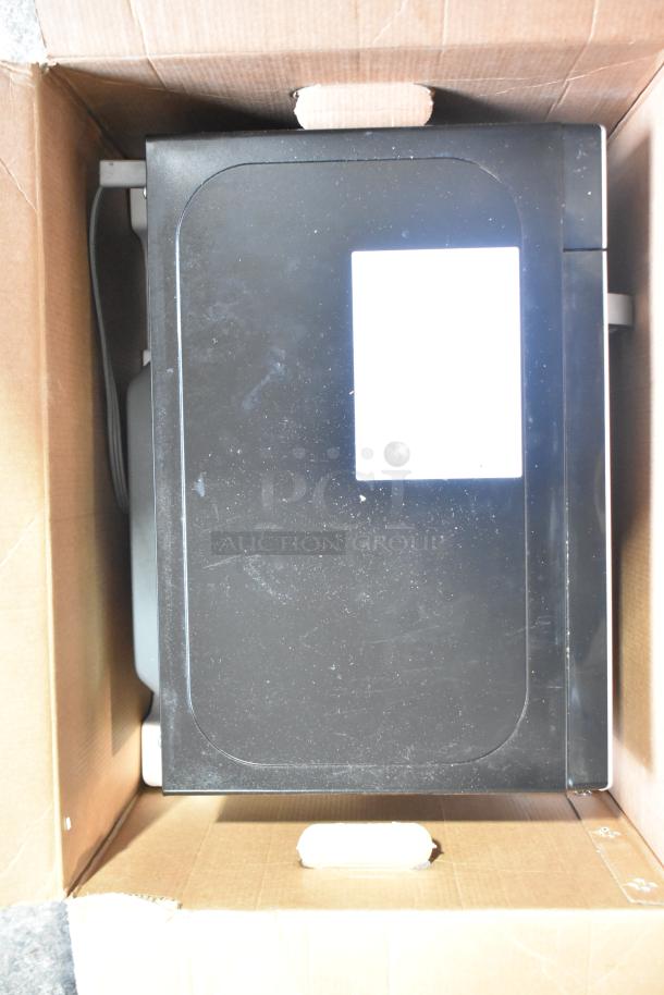 Black & Decker EM9225AB9 countertop microwave in original box, includes plate. 120 volts, 1 phase, excellent condition.