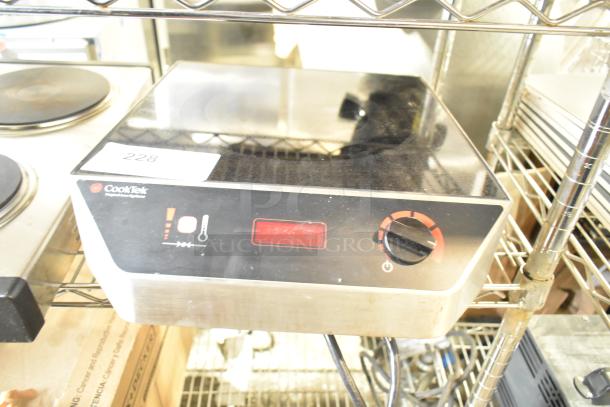 CookTek MC1800 stainless steel induction range, single burner, clean, 120V, with digital display and control knob.