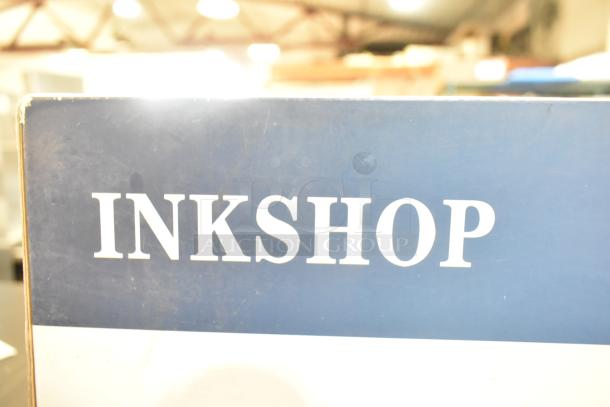 Inkshop Compatible Toner Cartridge box with Inkshop logo visible, showing mild wear. Ideal for printer replacement.