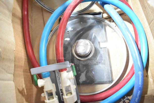 Tiered lot with poly bins, Kay hand sanitizer, and glass lid. Includes hoses and Ecolab connectors. Mixed condition.