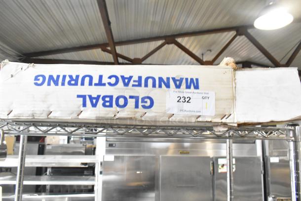 Cardboard box labeled "Global Manufacturing," containing EF-INTERLOCK Hose. Slightly worn, auction quantity: 1.