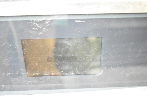 JennAir JJW2430DS01 stainless steel convection oven, commercial electric, visible wear on glass, 208/240 volts.