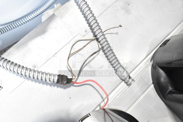 Power connections of a JennAir JJW2430DS01 stainless steel electric convection oven. 208/240 volts.