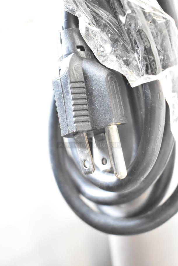 Precor Floor Style Elliptical power cord, 120 volts, 1 phase. Durable three-pronged plug with protective wrapping.
