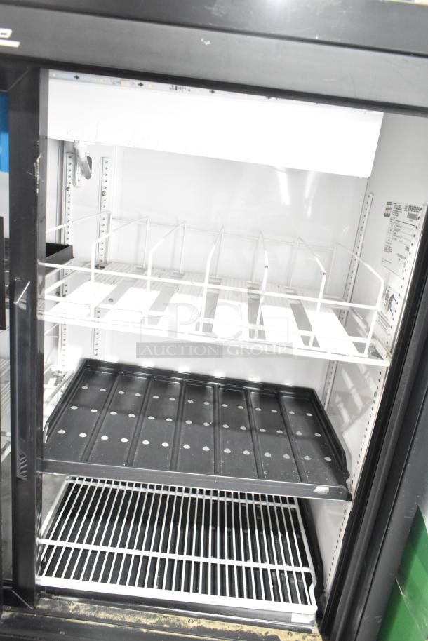 True GDM41SL48-HC-LD 2-door reach-in cooler merchandiser with poly-coated racks, 115V, 1 Phase, excellent condition.