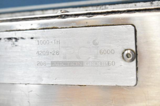 Alto Shaam 1000-TH Halo Heat oven, visible model and voltage markings, stainless steel, on commercial casters.