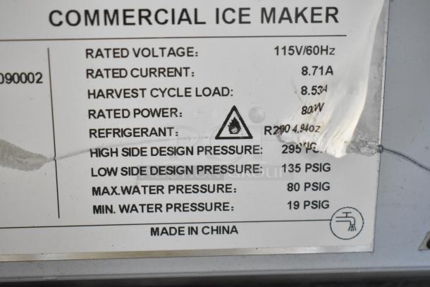 Alt text: Stainless steel Avantco 194MCF430A ice machine, 115V, commercial use, with label detailing voltage, current, pressures.