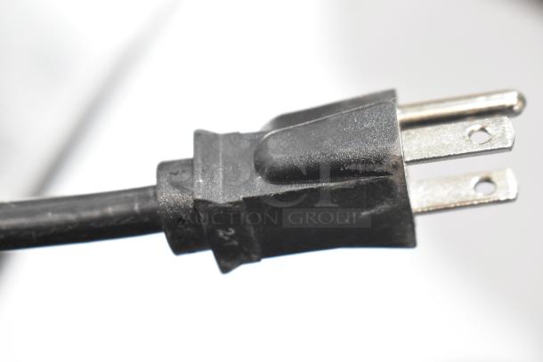 Hatco GRFFB Glo Ray metal food warming strip plug. 120 volts, 1 phase. Close-up on power cord and plug.