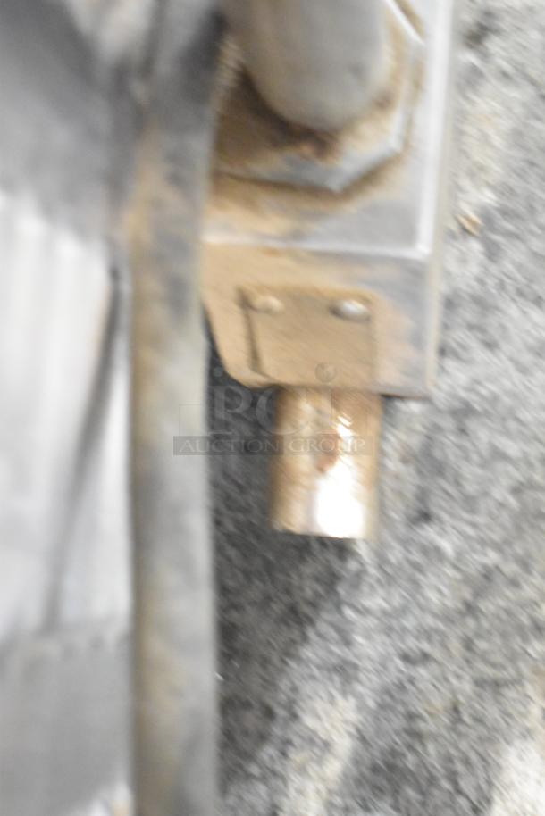 Groen HY-3E steam cabinet detail, 240V, 3 phase, stainless steel. Visible rust and wear on the connecting pipe.