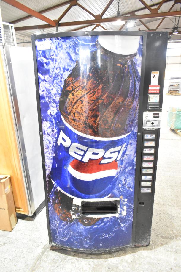 Metal commercial bottle vending machine, Pepsi branding, 115 volts, 1 phase, visible control panel, used condition.