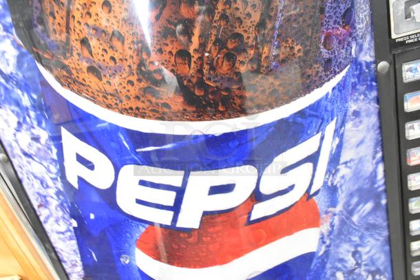 Metal commercial bottle vending machine featuring Pepsi branding. Operates on 115 volts, 1 phase.