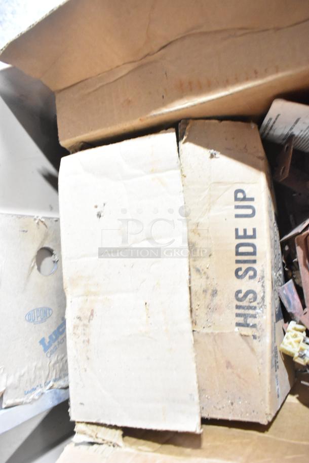 Lot including kegerator hoses and couplers in worn boxes marked "THIS SIDE UP" and "Dupont." Items appear used.